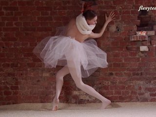 Hot and skinny ballerina Ksyuha Zavituha strips and spreads her legs